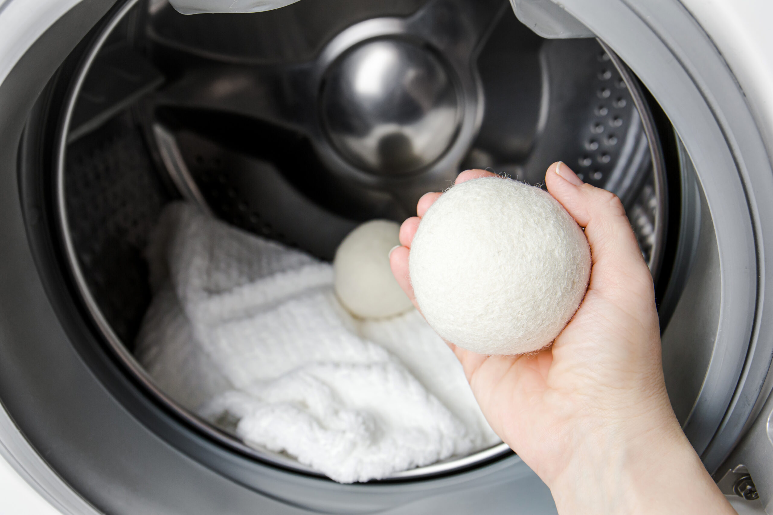 Dryer with towel and wool balls